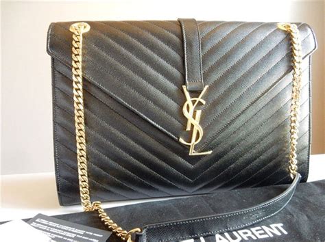 ysl grained leather clutch|YSL clutch with chain.